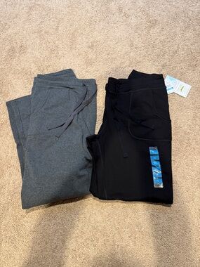 Pair of Earth Yoga women’s Sweatpants - Black & Charcoal